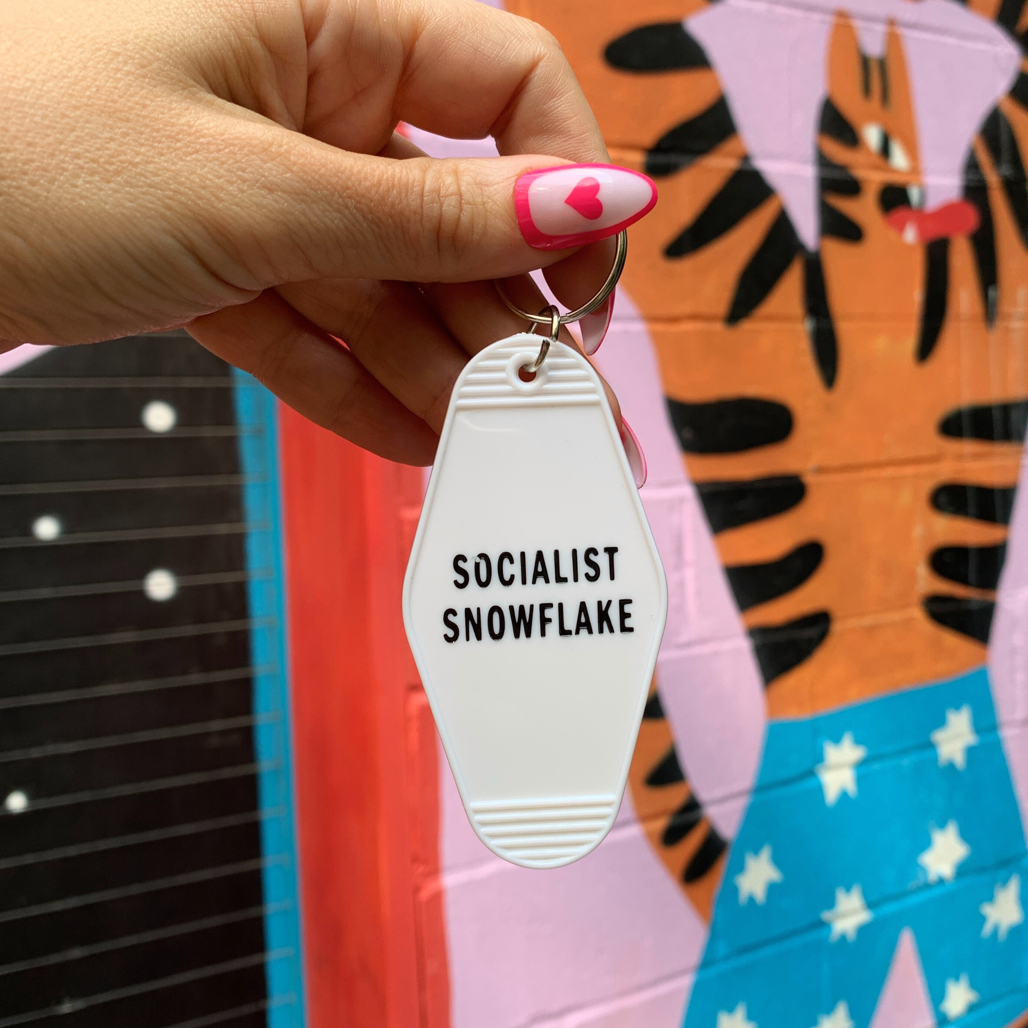 Socialist Snowflake White Motel Style Keychain